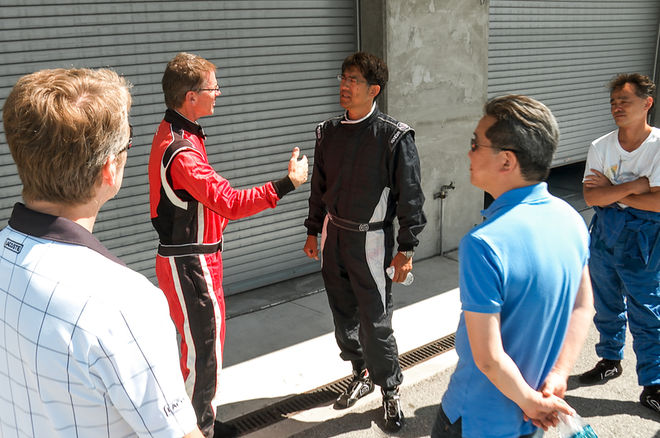 2018-Lexus-LC-500-Randy-Pobst-talking-with-Sato-and-team.jpg
